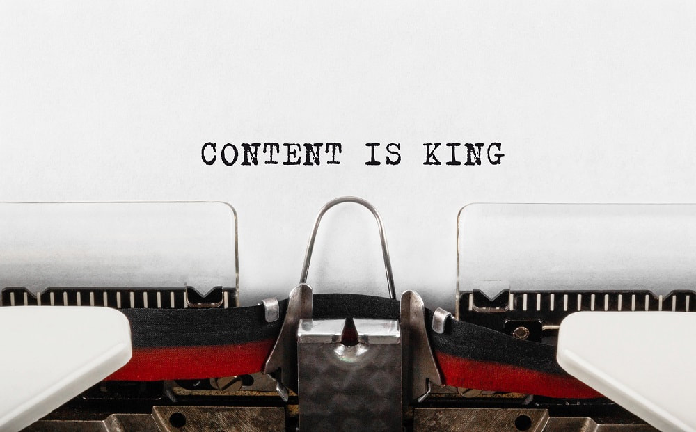 blog image_content is king written on paper of old typewriter_blog title: is content still king in 2023_blog for perfect layout digital marketing