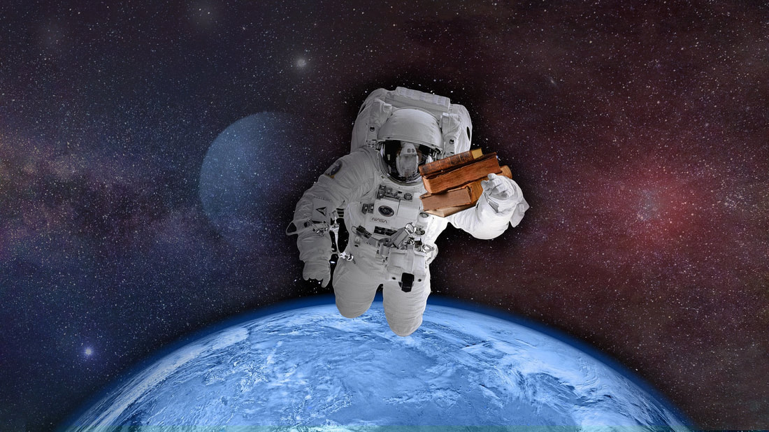 Picture of an astronaut in space holding books in one arm