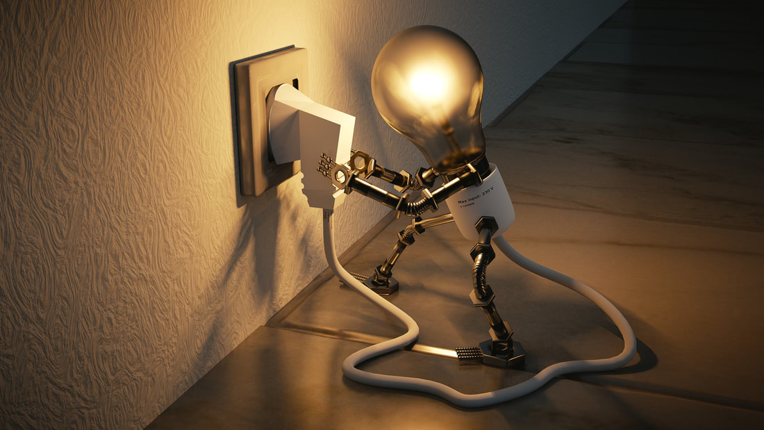 Image of a little light bulb that has legs and arms, plugging itself into a wall and the light coming on.