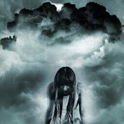 woman with her head down surrounded by dark clouds
