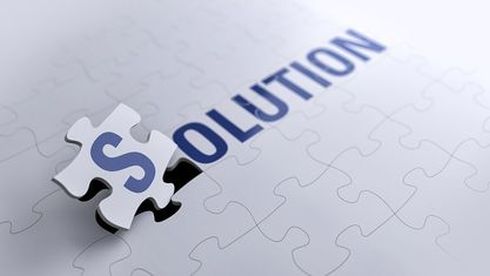 jigsaw puzzle with the word solution 